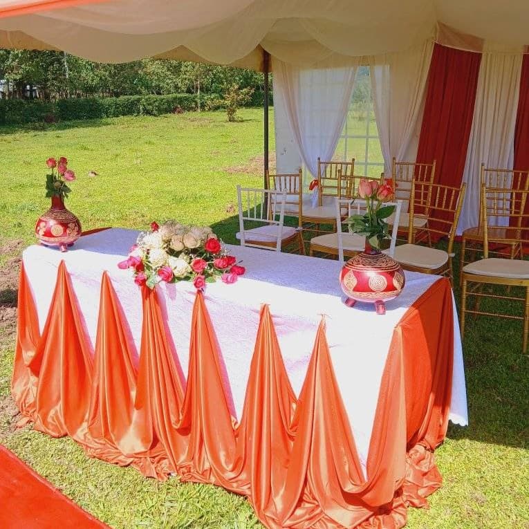 Luxury high-back king and queen throne chairs on elevated dais